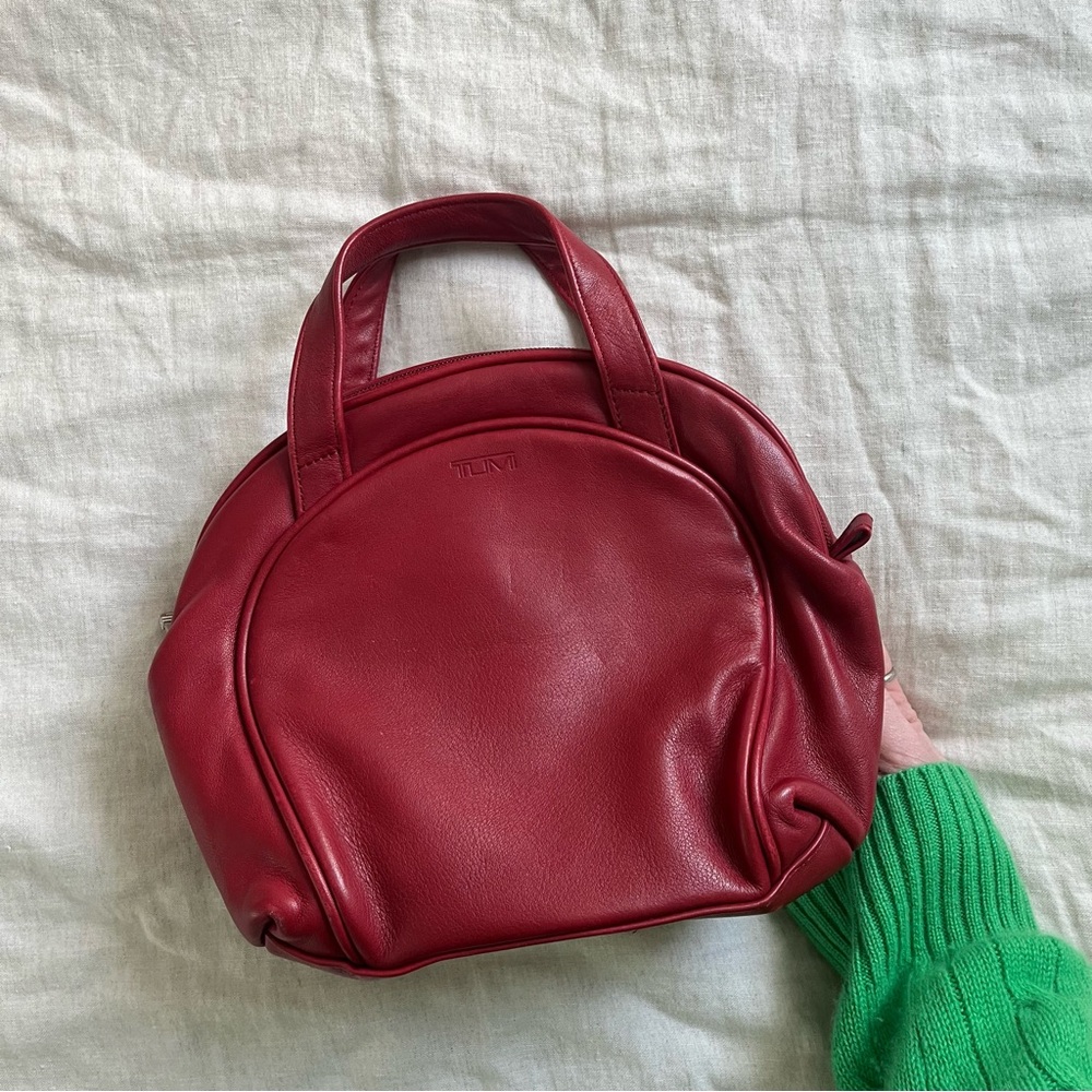 Leather Tumi mini handbag